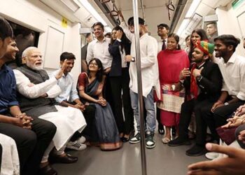 PM Modi takes a rides in Delhi Metro to attend DU centenary celebrations