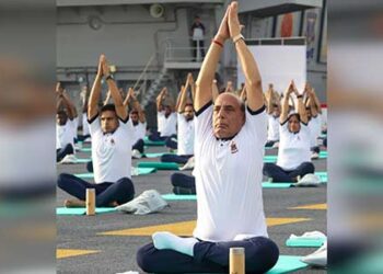 Rajnath Singh and Chief of Naval Staff Admiral R Harikumar joined naval and defence personnel onboard INS Vikrant for International Day of Yoga celebrations