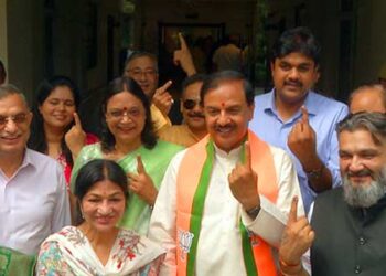 Dr. Mahesh Sharma cast their vote