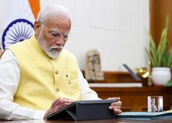 Narendra Modi takes charge as Prime Minister; signs first file for farmers’ welfare